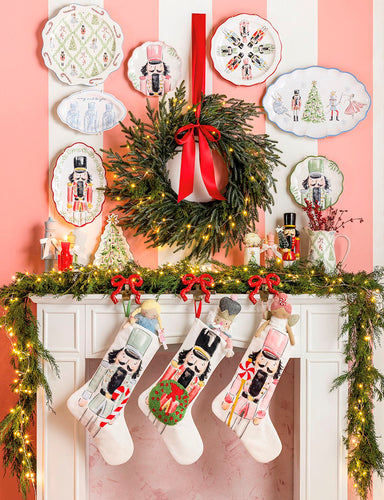 Nutcracker platter displayed near a mantel with stockings