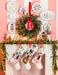Nutcracker platter displayed near a mantel with stockings