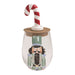 Stemless wine glass with nutcracker design and nutcracker bottle stopper