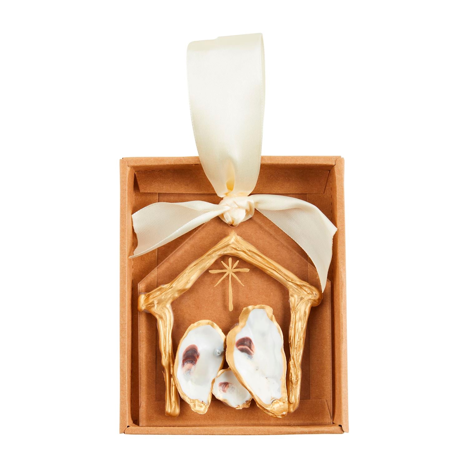 Clear acrylic ornament with an oyster shell Nativity scene and ribbon