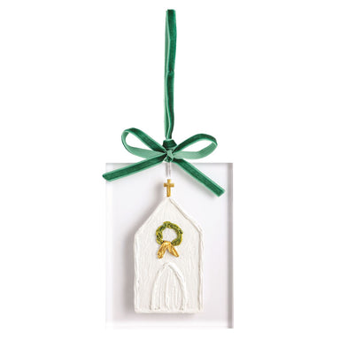Acrylic ornament with a painted church and green velvet bow