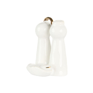 White ceramic Holy Family figurine shown from the side