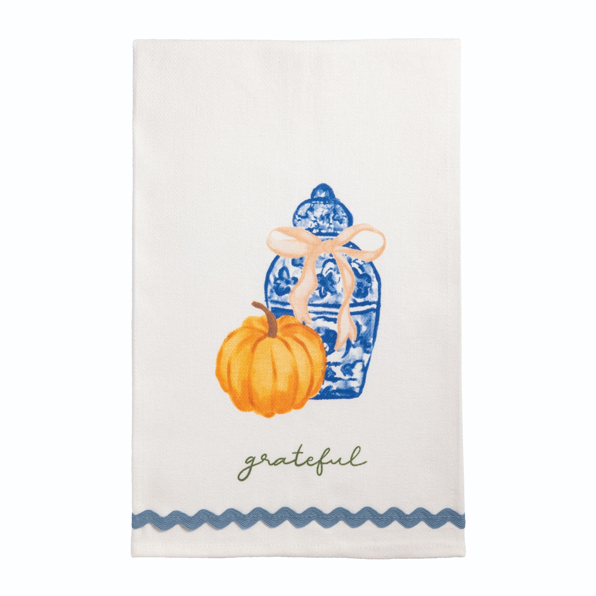White hand towel with a pumpkin and blue and white ginger jar and grateful script