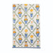 Hand towel with an allover pattern of blue and white pumpkin topiaries