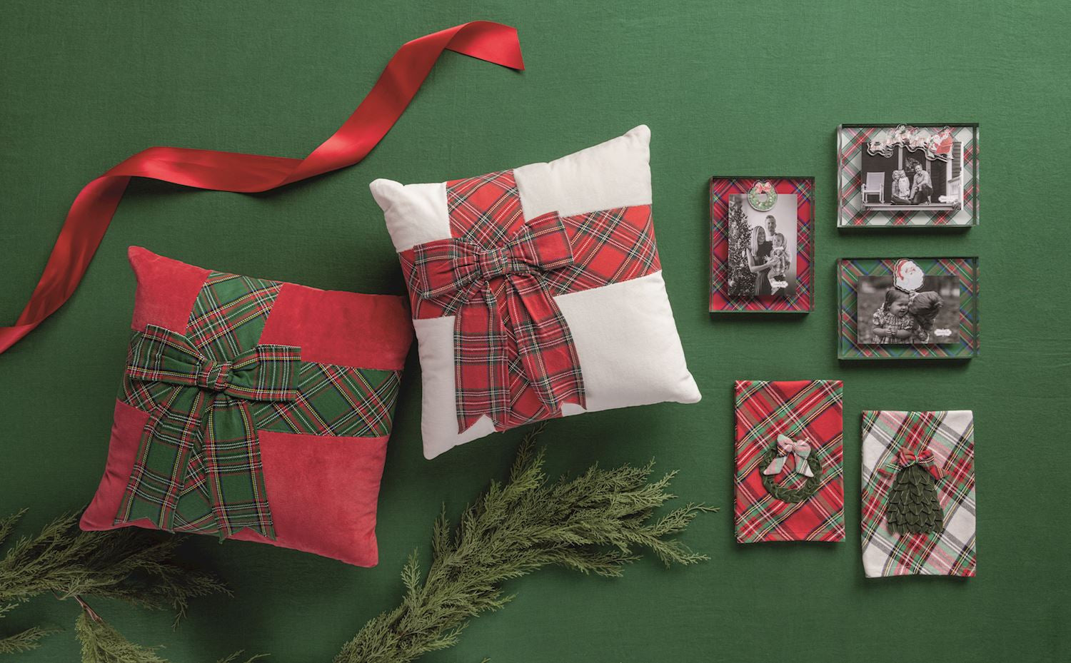 Tartan bow pillows on a green background