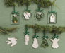 Turtle dove ornaments displayed with greenery