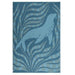 Blue rug with a seal and seaweed design on a white background