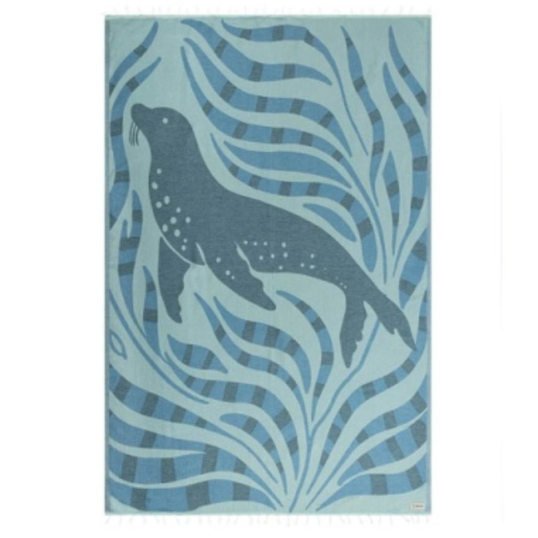 Rug with a seal design in blue and gray on a white background