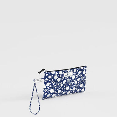 Floral patterned pouch with wrist strap on a light gray background
