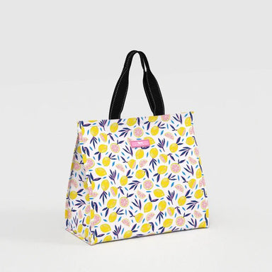 Floral patterned tote bag with black handles on a light gray background