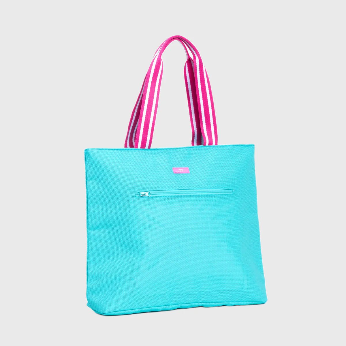 Turquoise tote bag with pink and white striped handles on a light gray background