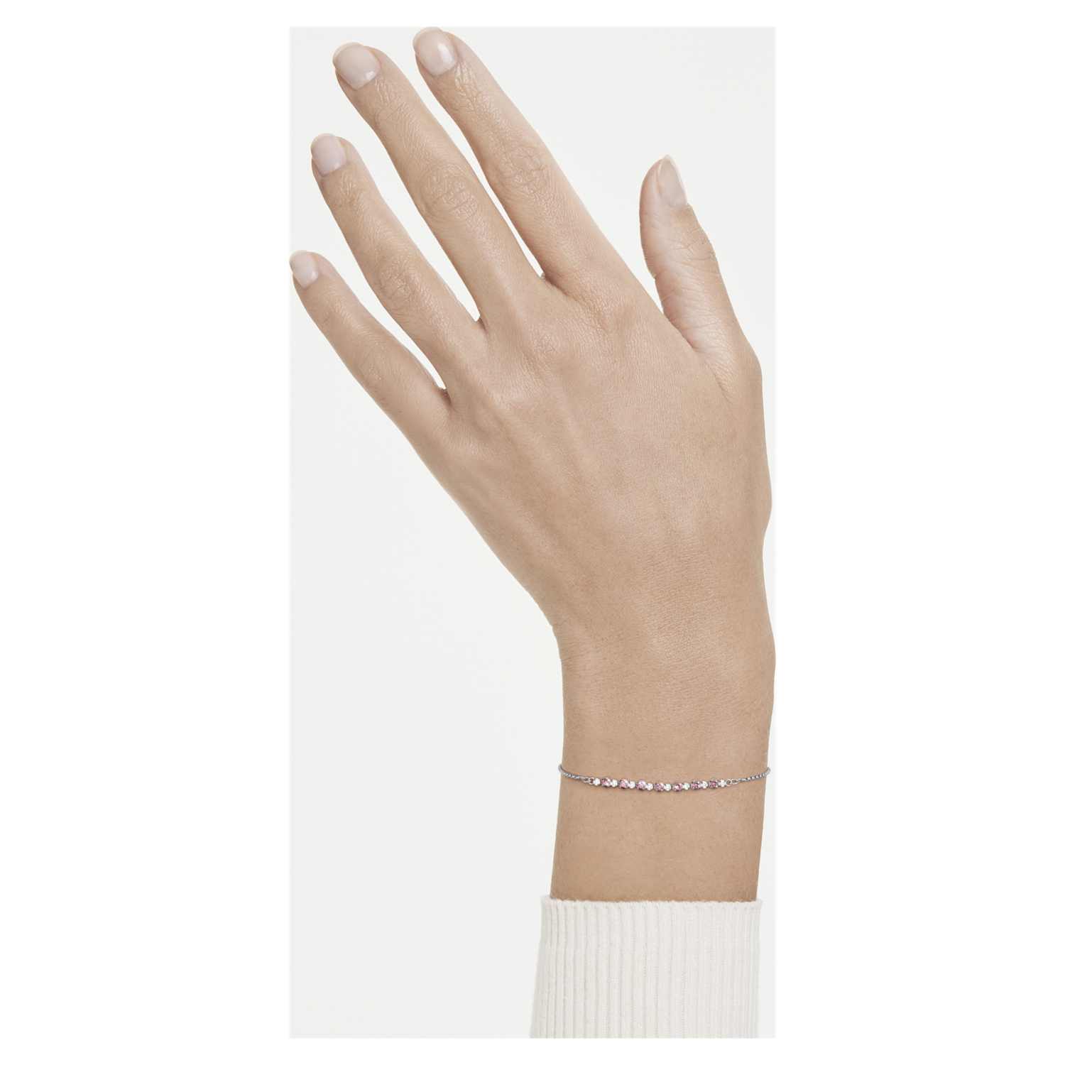 Model wearing the silver Matrix bracelet with pink and clear stones