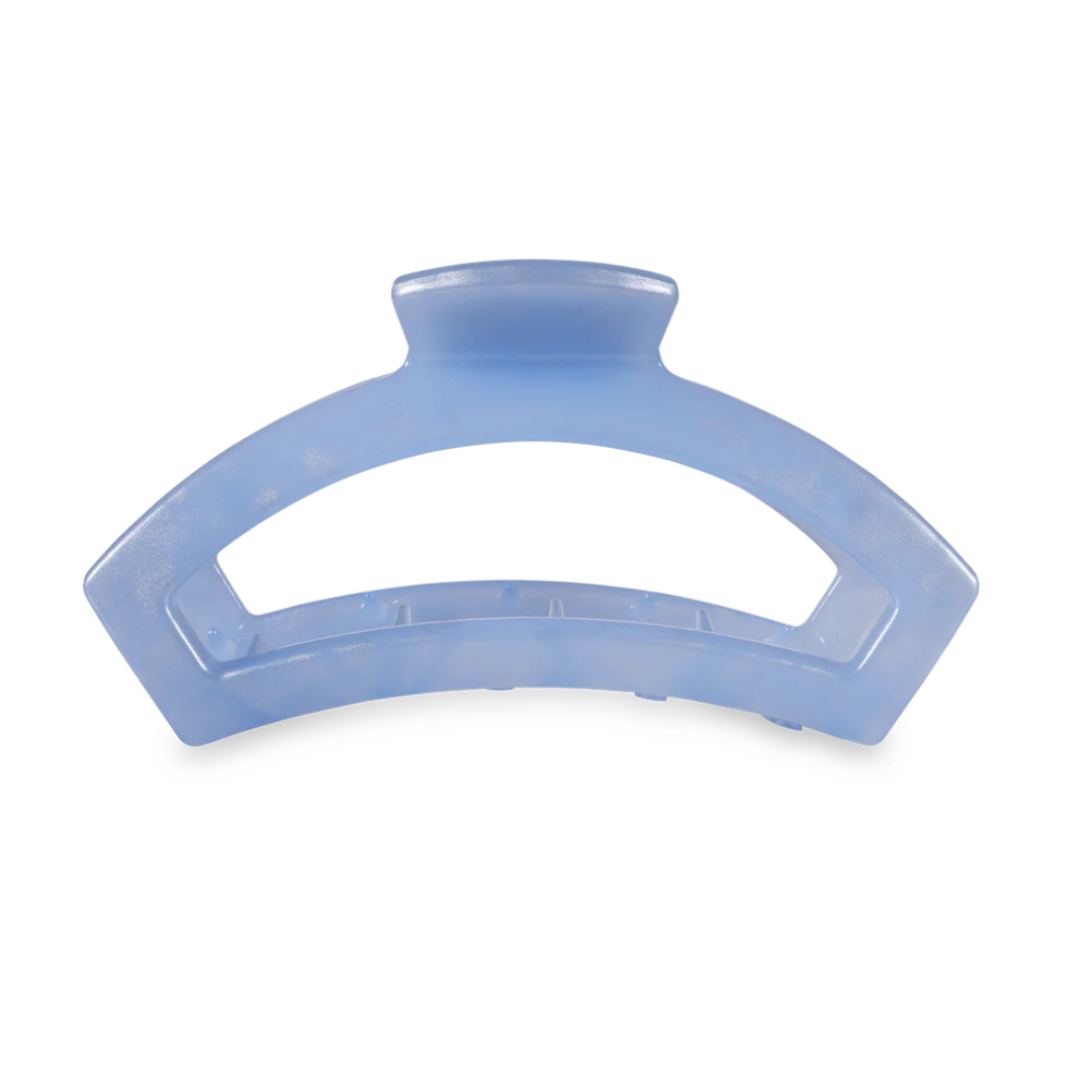 blue hair clip on white background