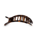 tortoise colored hair clip against white background